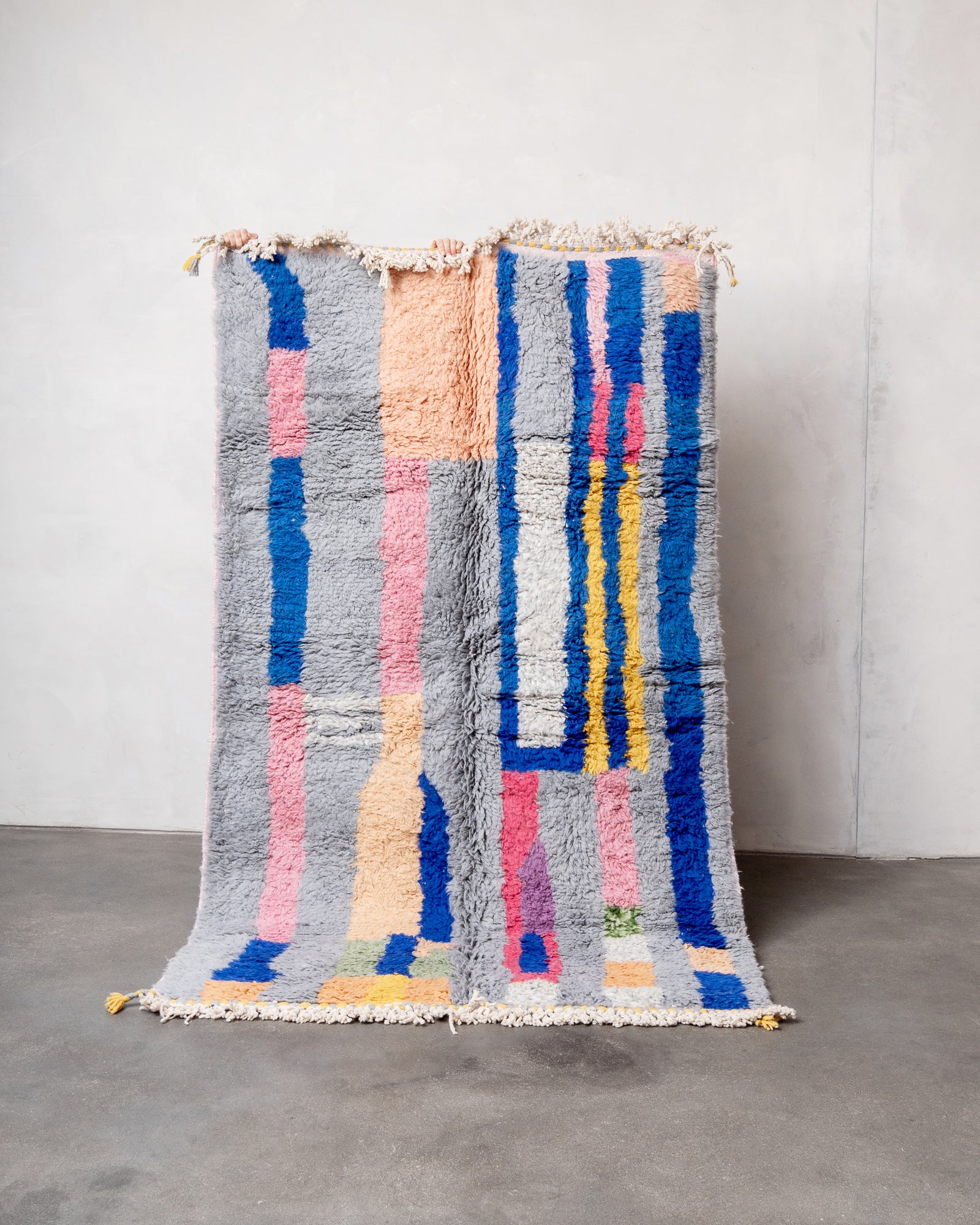 Modern, designer, handcrafted Berber rug from Morocco. Beniourain carpet with beautiful colours and patterns and fluffy wool texture.